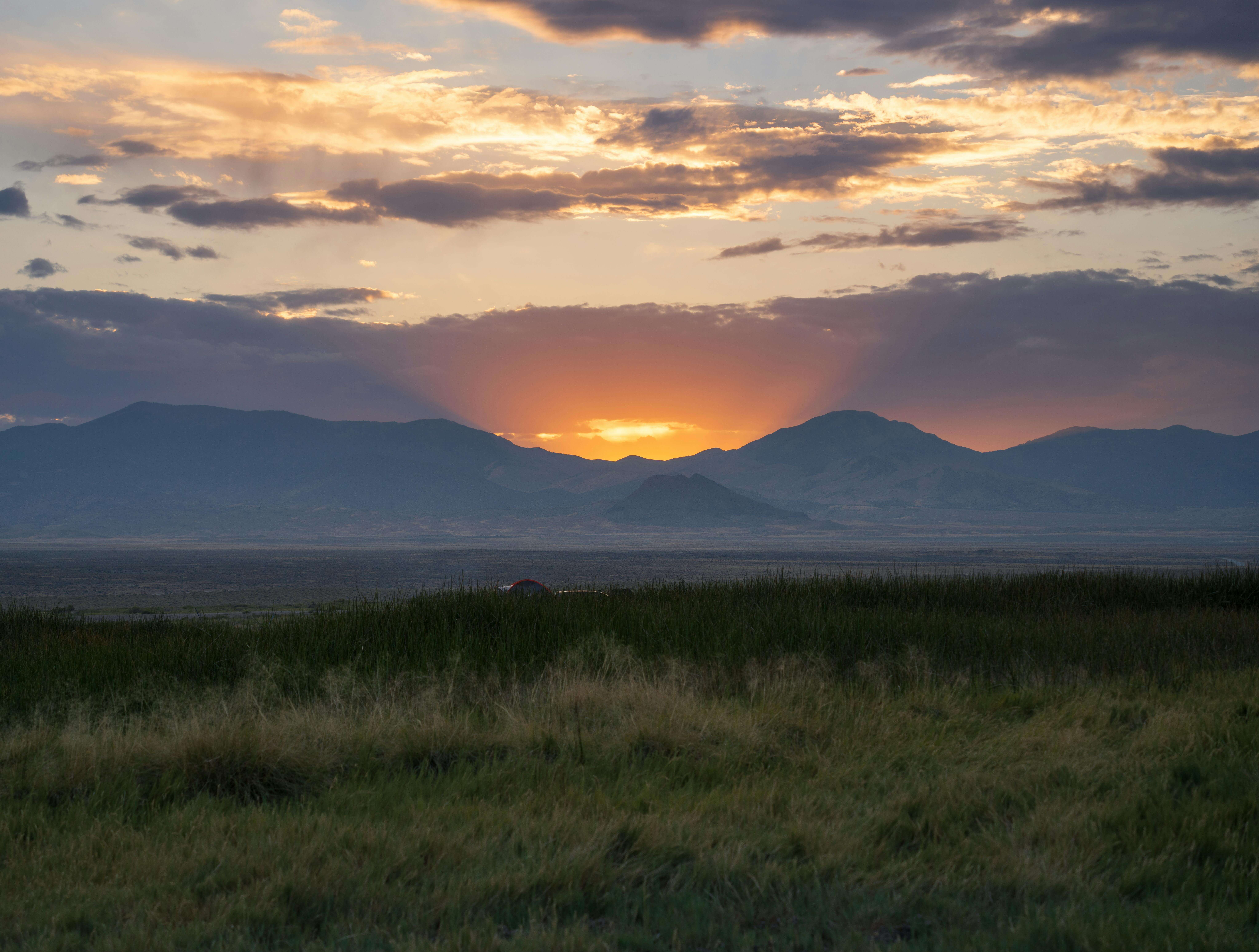 Golden summer light over Sierra Nevada mountain valley