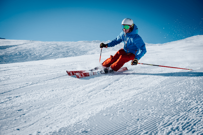Skier carving deep powder at a Sierra Nevada resort near Carson City